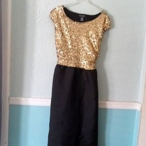 Size Xl Formal gown Long. Gold sparkle top .Black bottom